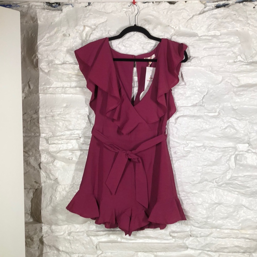 NWT - Luxxel ruffled romper in berry